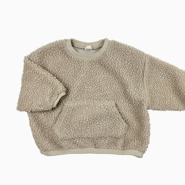 Pull greige en sherpa XS 9-12M