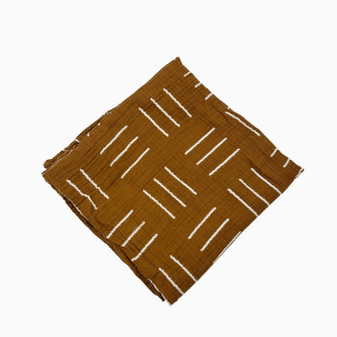 Couverture marron à motifs en mousseline