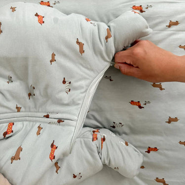 Combi gigoteuse bleue 'chiens' en bambou et spandex 1.0TOG 18-36M