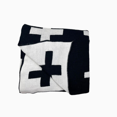 Couverture en tricot d'acrylique avec croix