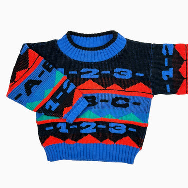 Pull colorblock 'chiffres et lettres' en tricot vintage 4Y