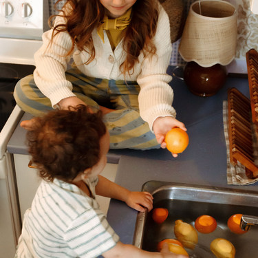 Cardigan vanille en tricot de coton bio 8Y