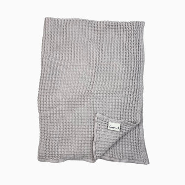 Couverture grise en coton gaufré