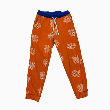 Jogger orange en coton bio 8Y