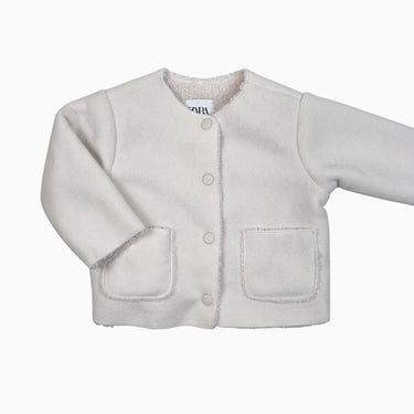 Manteau vanille en polar doublée en sherpa 6-9M