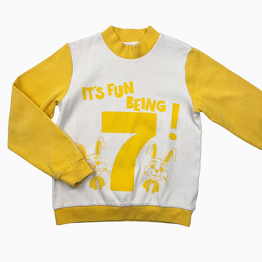 Pull crème et jaune en coton cotelé 'It's fun being 7!' 128-134 (8-9Y)